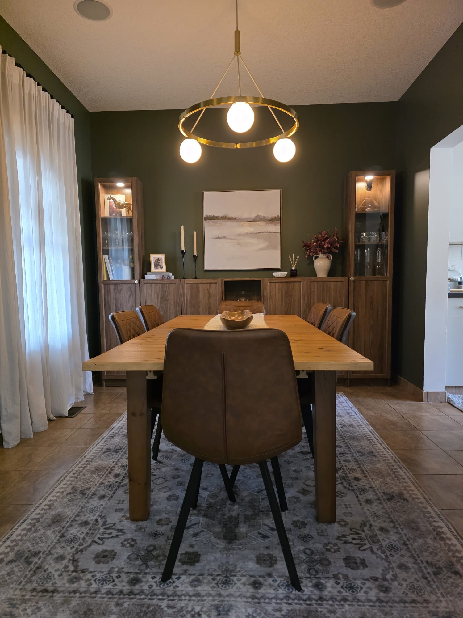 Dining room — green accent wall